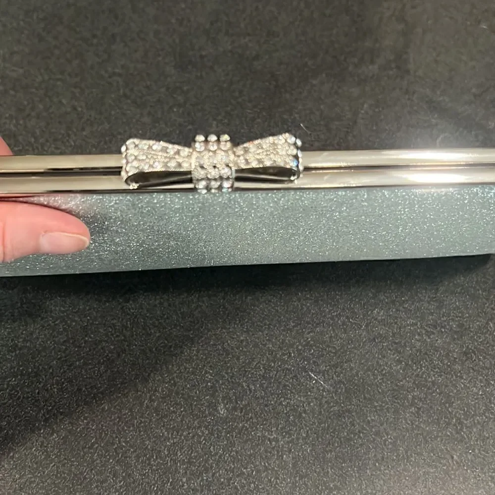 NWOT INC International Concepts Silver Sparkly Bowed Clutch